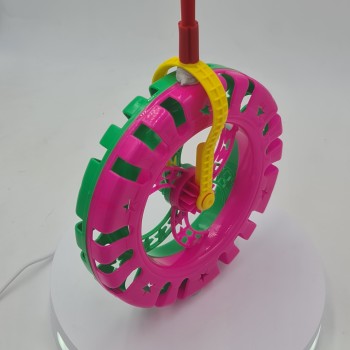 Interaktív játék, zörgő kerék, 20 x 40 cm, rózsaszín/zöld