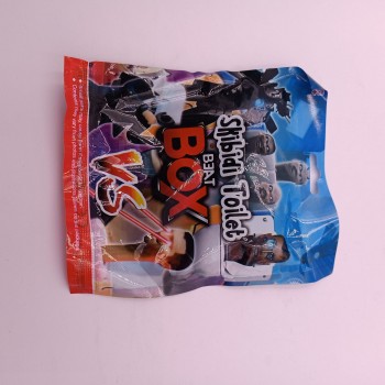 Plic Skibidi Toilet Beat Box, cu Figurina si Cartonase Surpriza, 9 cm