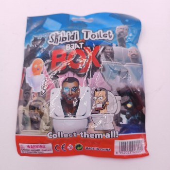 Plic Skibidi Toilet Beat Box, cu Figurina si Cartonase Surpriza, 9 cm